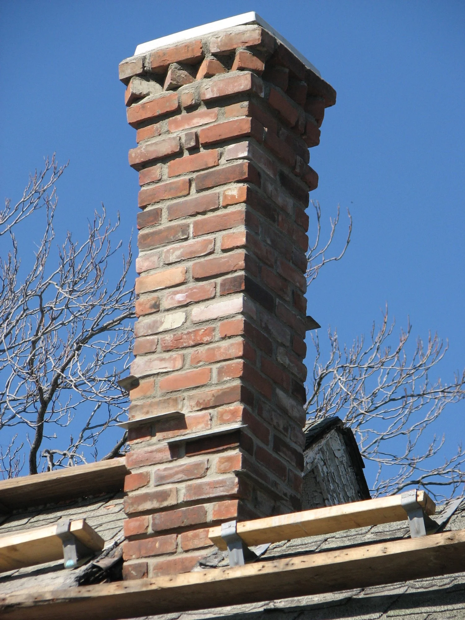 The chimney complete.  37' tall from basement floor, with decorative design from the Slate Roof Bible, and slate drip stones