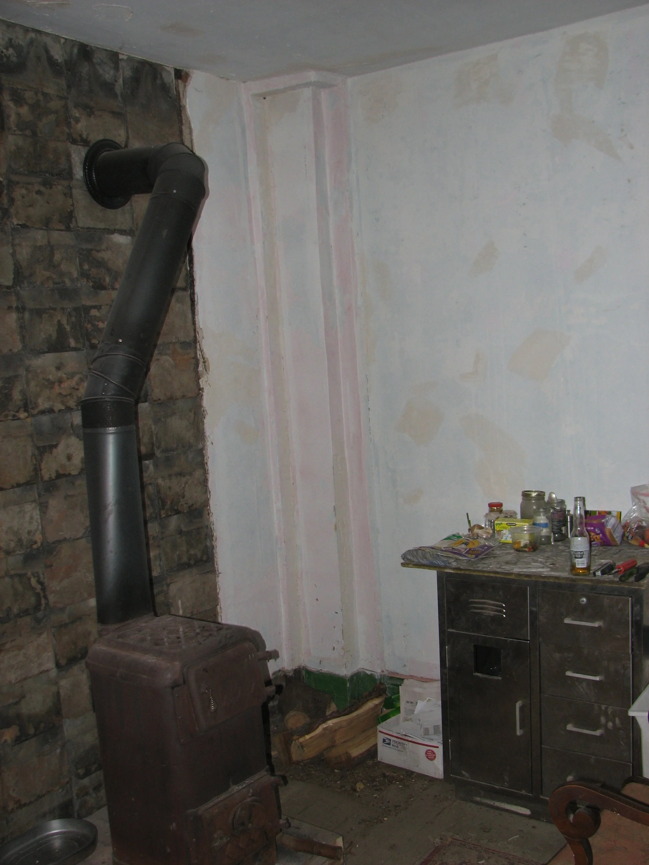 The wood stove that saved me during the first few winters in the kitchen