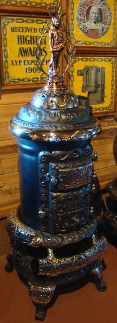 Very rare hard to find Round Oak E-12'' Stove. Restored with a small three feathered Indian finial
$4250