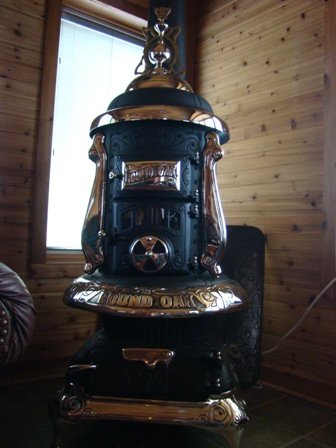 Restored 18-T-3 Round Oak Heater. $2450.00