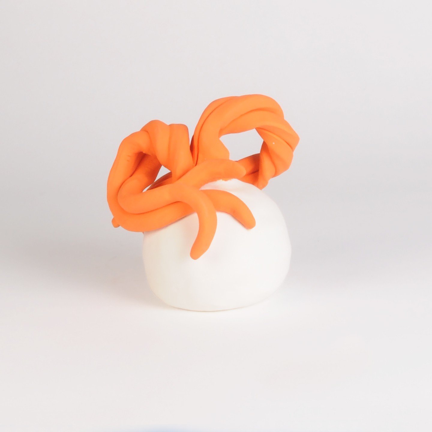 Wild One #85. Solid Colors, Orange and White. Made of Sea 65 White Clay. 

See my other work on my website shop: www.annelindsaystudio.com and
my Etsy shop:
http://etsy.com/shop/annelindsaystudios

#ceramics #ceramicart #ceramic #contemporaryceramics