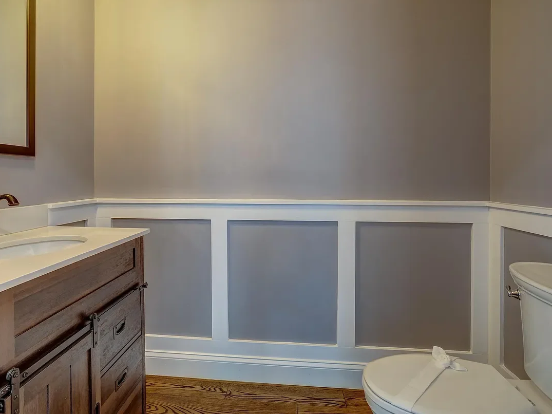 Bathroom with custom wall molding detail