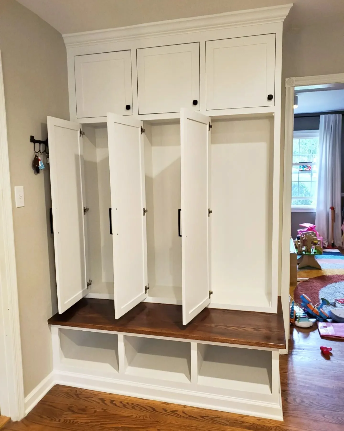 built in custom carpentry lockers with bench