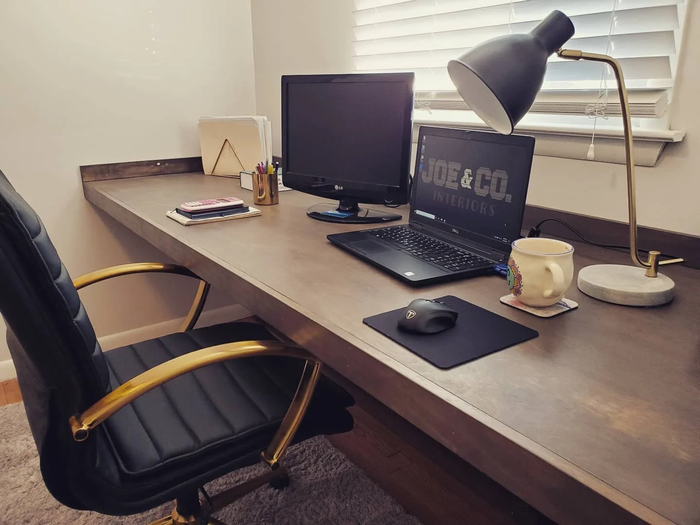 Custom floating desk in a dark wood tone