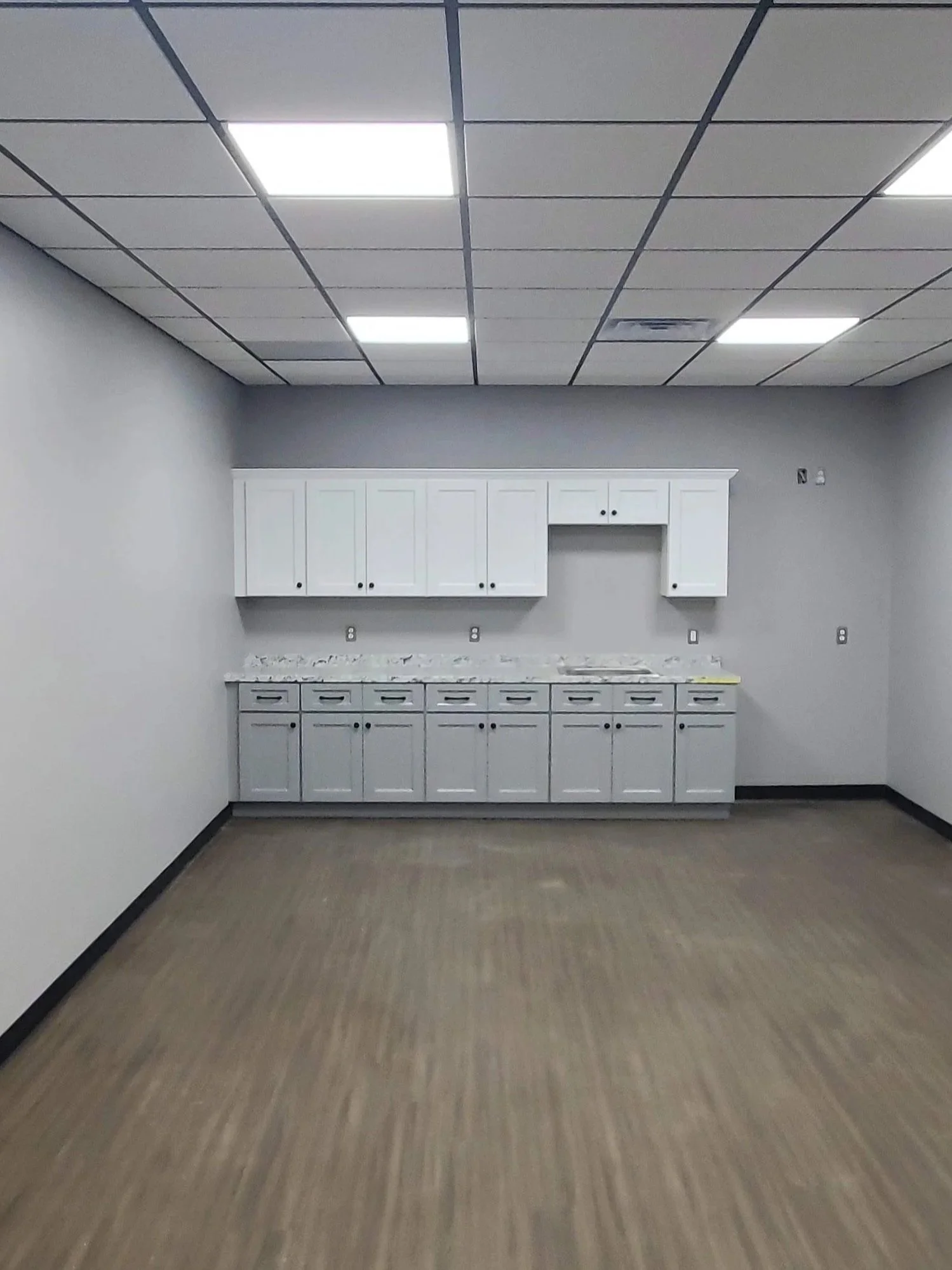 Simple white office kitchen