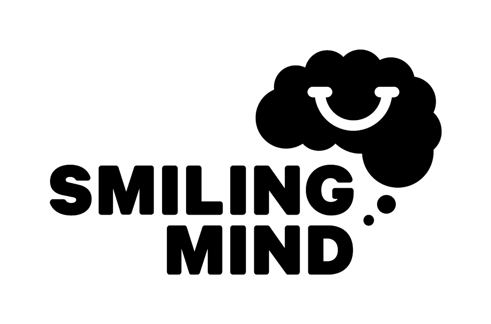 Black and white graphic featuring a smiling brain combined with the phrase "Smiling Mind" in bold letters.