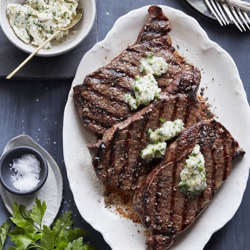 Grilled Rib Eye Steak with Parrano Herb Compound Butter