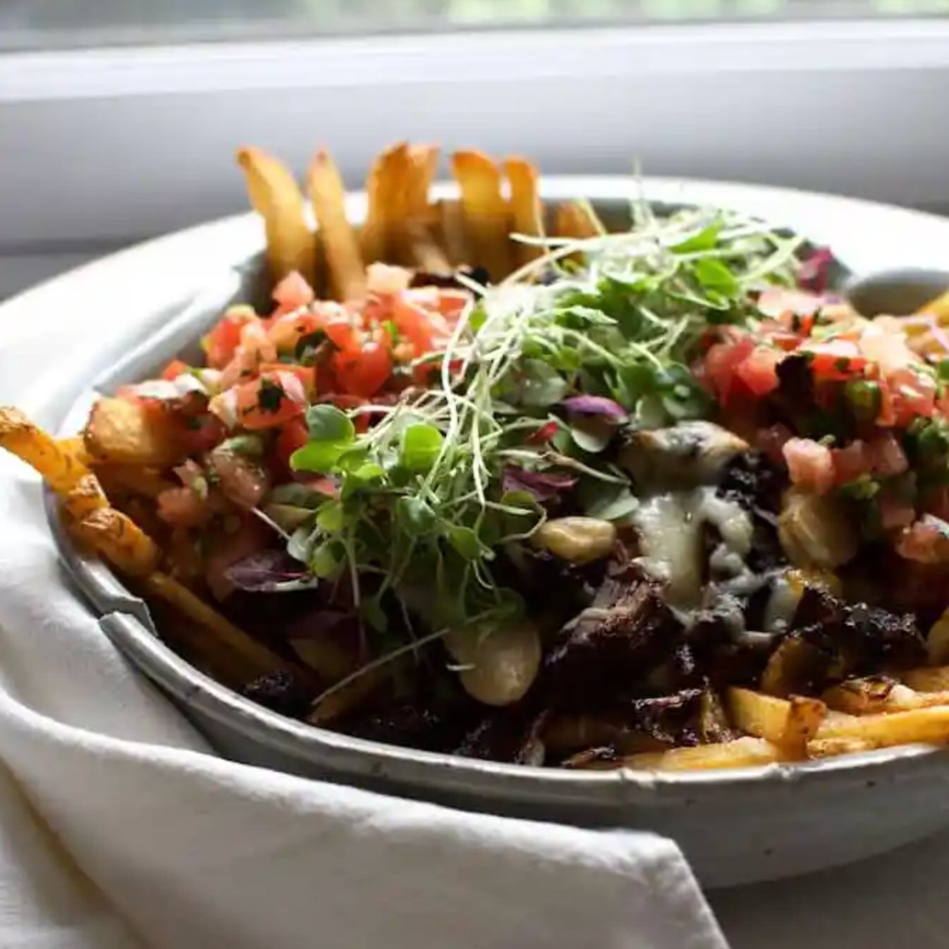 Loaded Black Mole Fries with Braised Beef