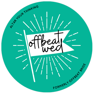 A teal circular badge with the text 'altar your thinking' at the top, 'formerly offbeat bride' at the bottom, and a white banner in the center with 'offbeat wed' in black handwritten font. Radiating lines emanate from the banner.