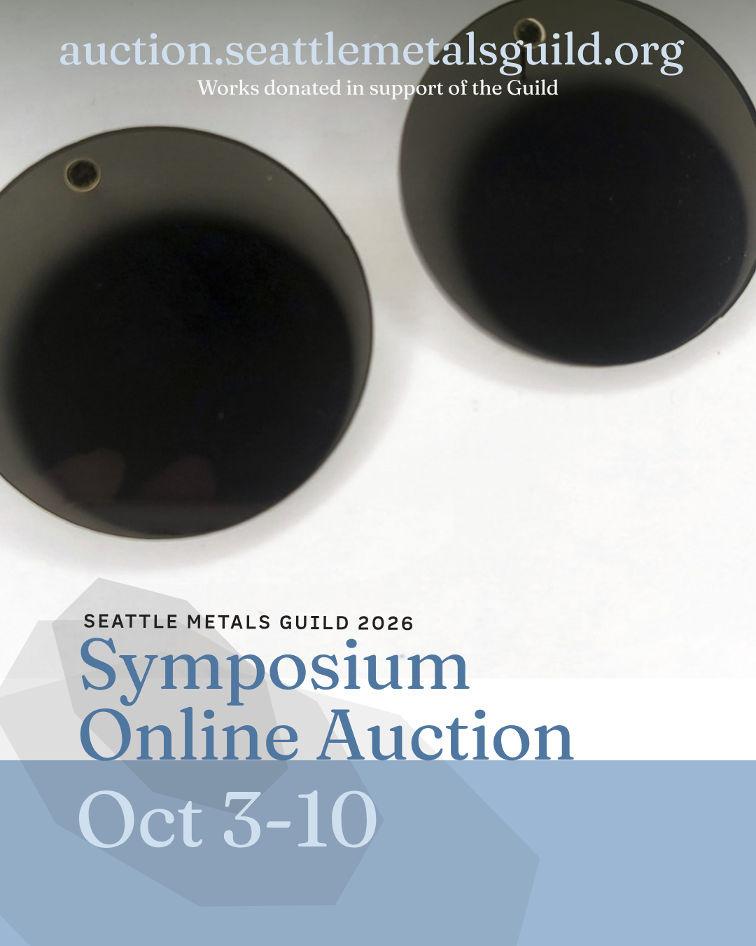Unattributed - black round earrings.png