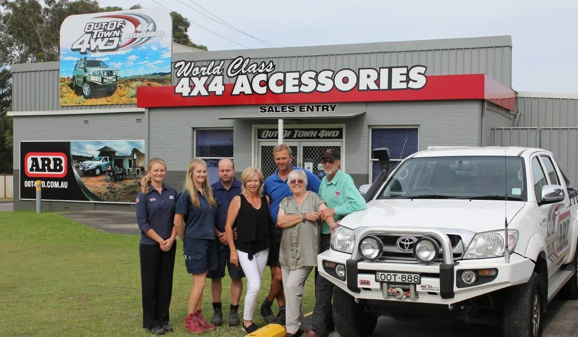 Multi-generational family photograph of the Black family, highlighting the founders and successive generations who have helped shape the Out Of Town 4WD Group since 1976.