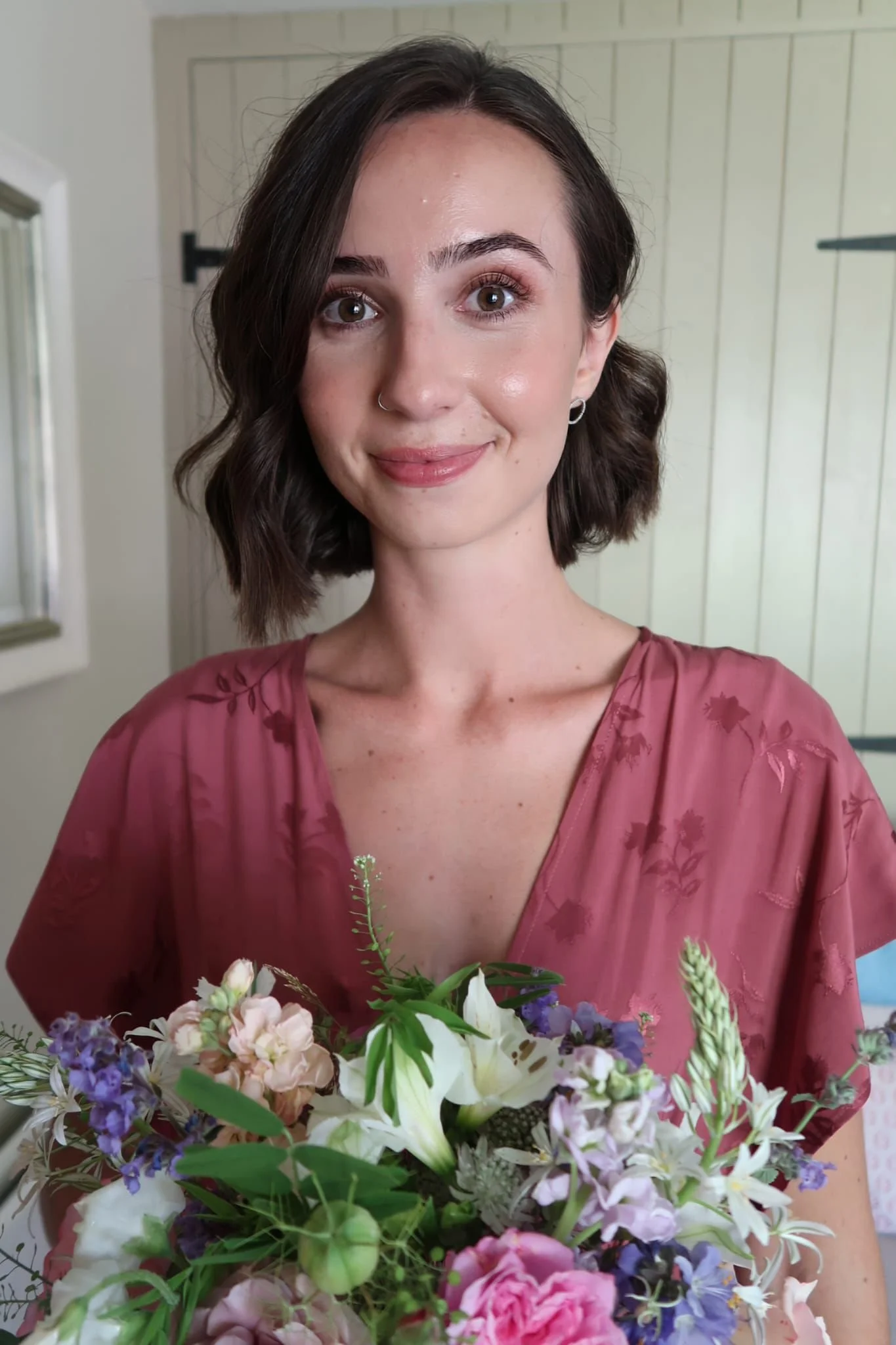 Bridesmaid with a soft glam makeup look, at a wedding in Berkshire