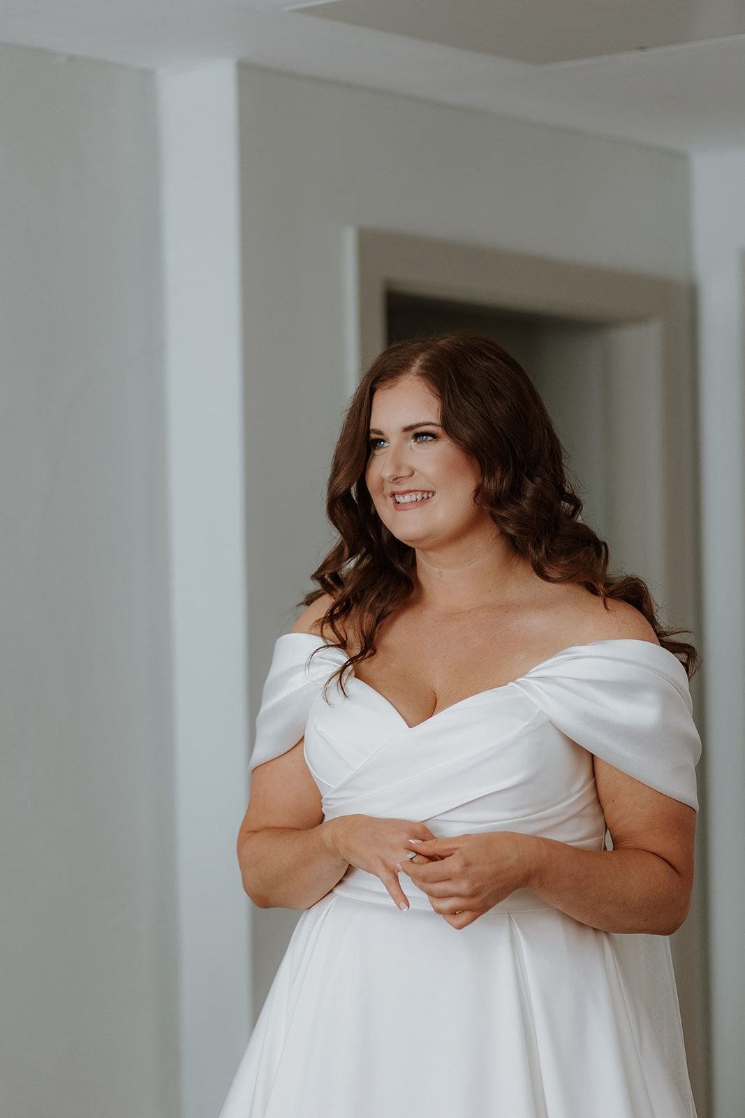 Bride with soft glam makeup and in her wedding dress, based in Berkshire
