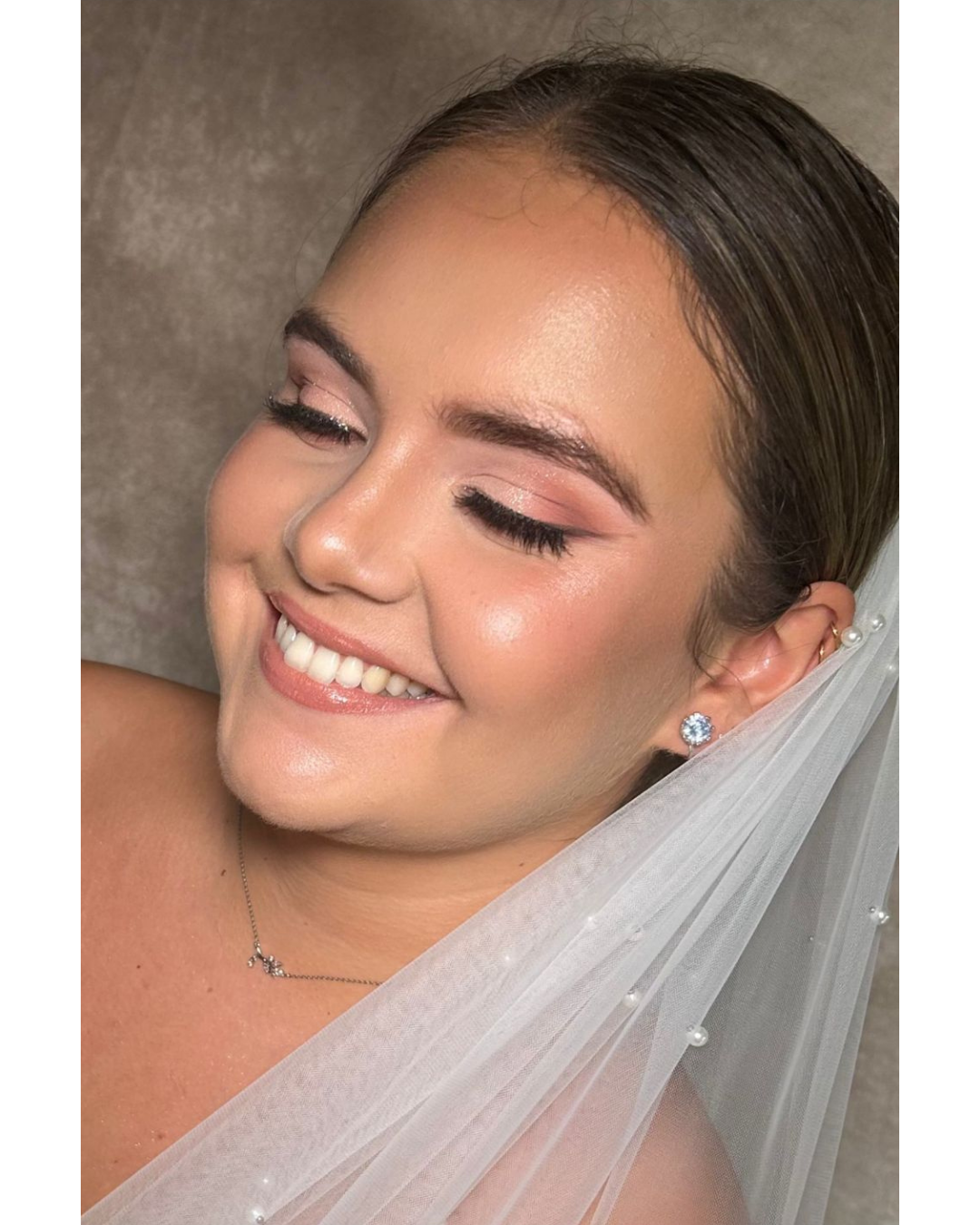 Close up of Bridal Glam makeup look with soft pink tones.