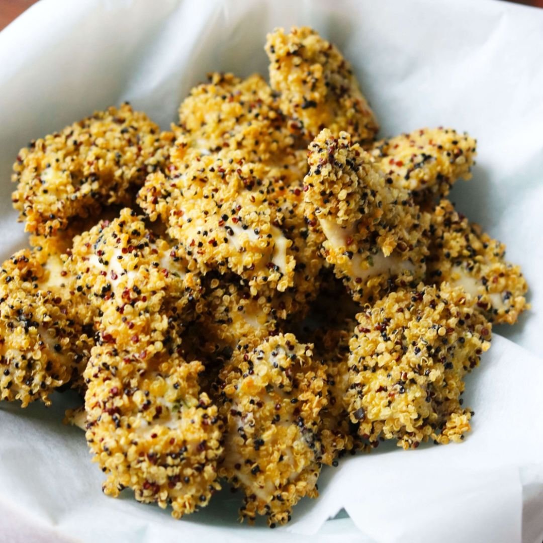 Chicken nuggets crusted in quinoa in a bowl
