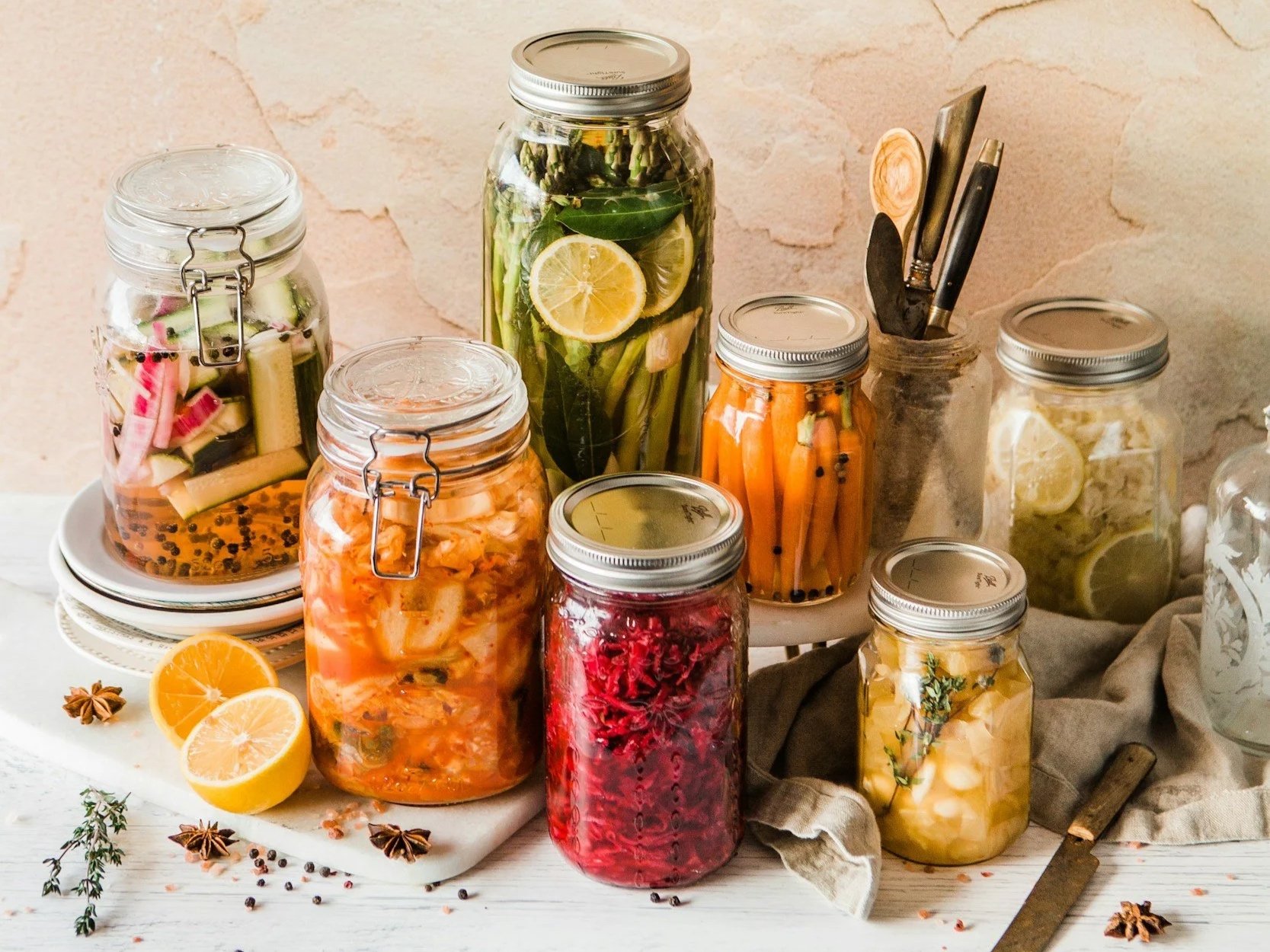 Fermented vegetables in glass jars on a counter