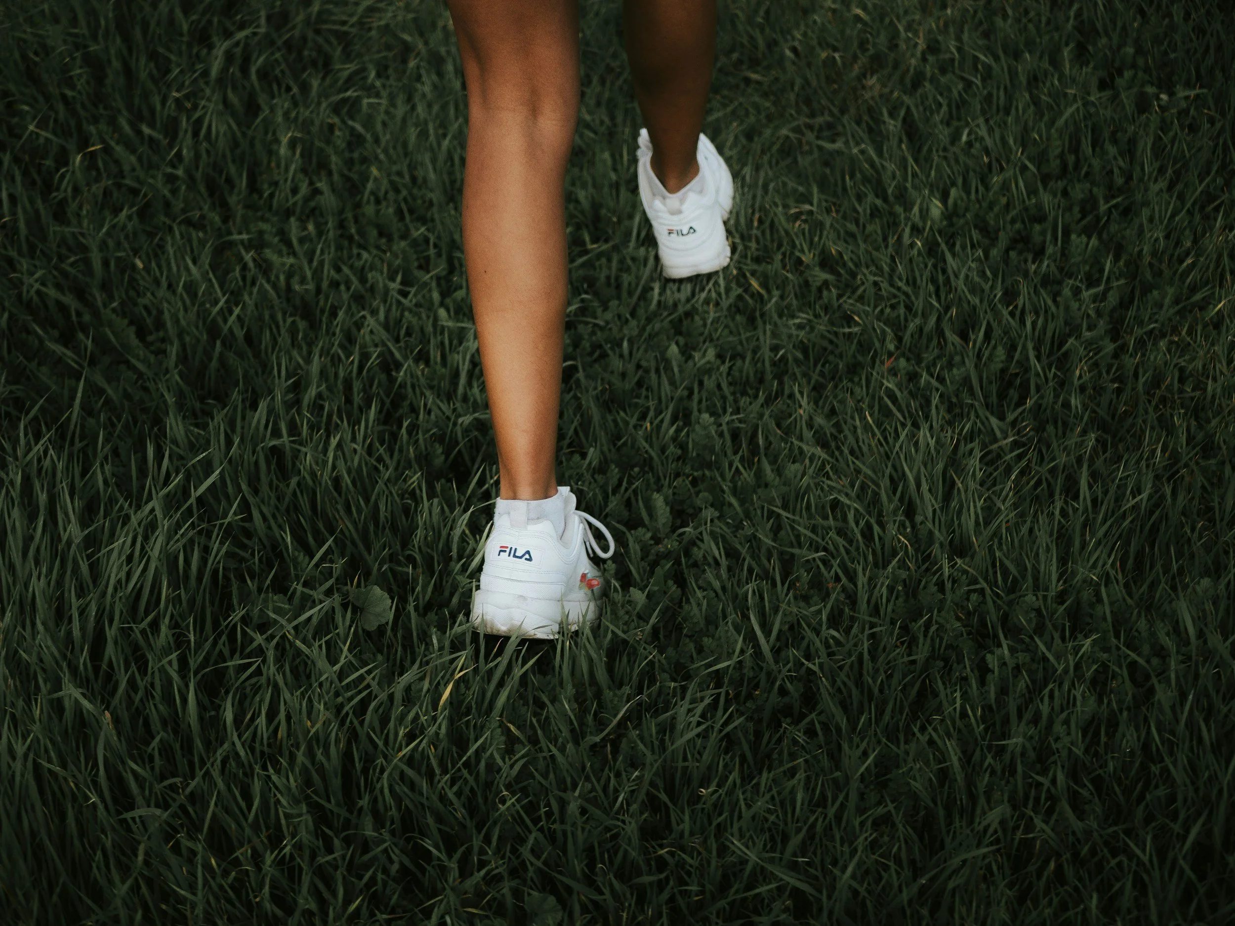 Woman walking outdoors