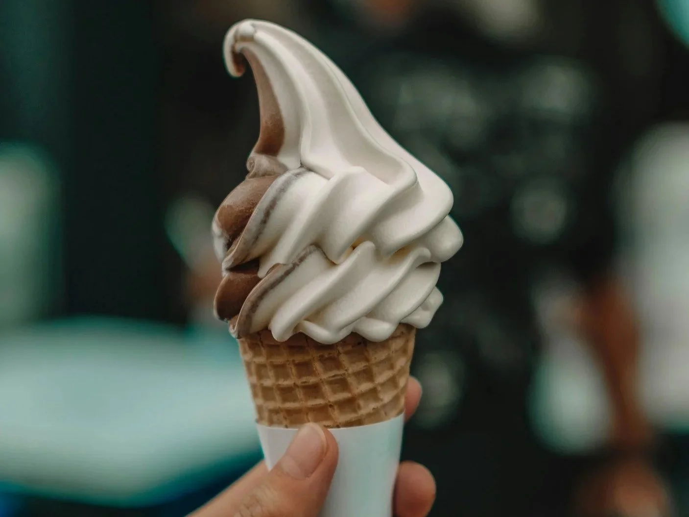 Soft serve chocolate and vanilla ice-cream on a summer day