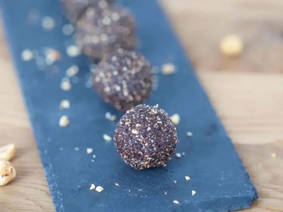 Chocolate protein balls on platter