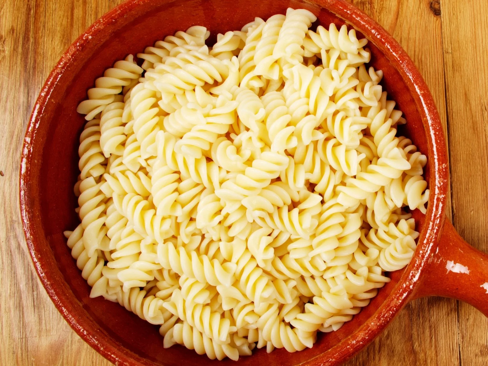 A bowl of cooked fusilli protein pasta