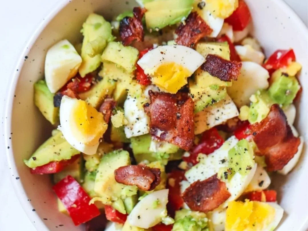 Egg bacon and avocado in a bowl