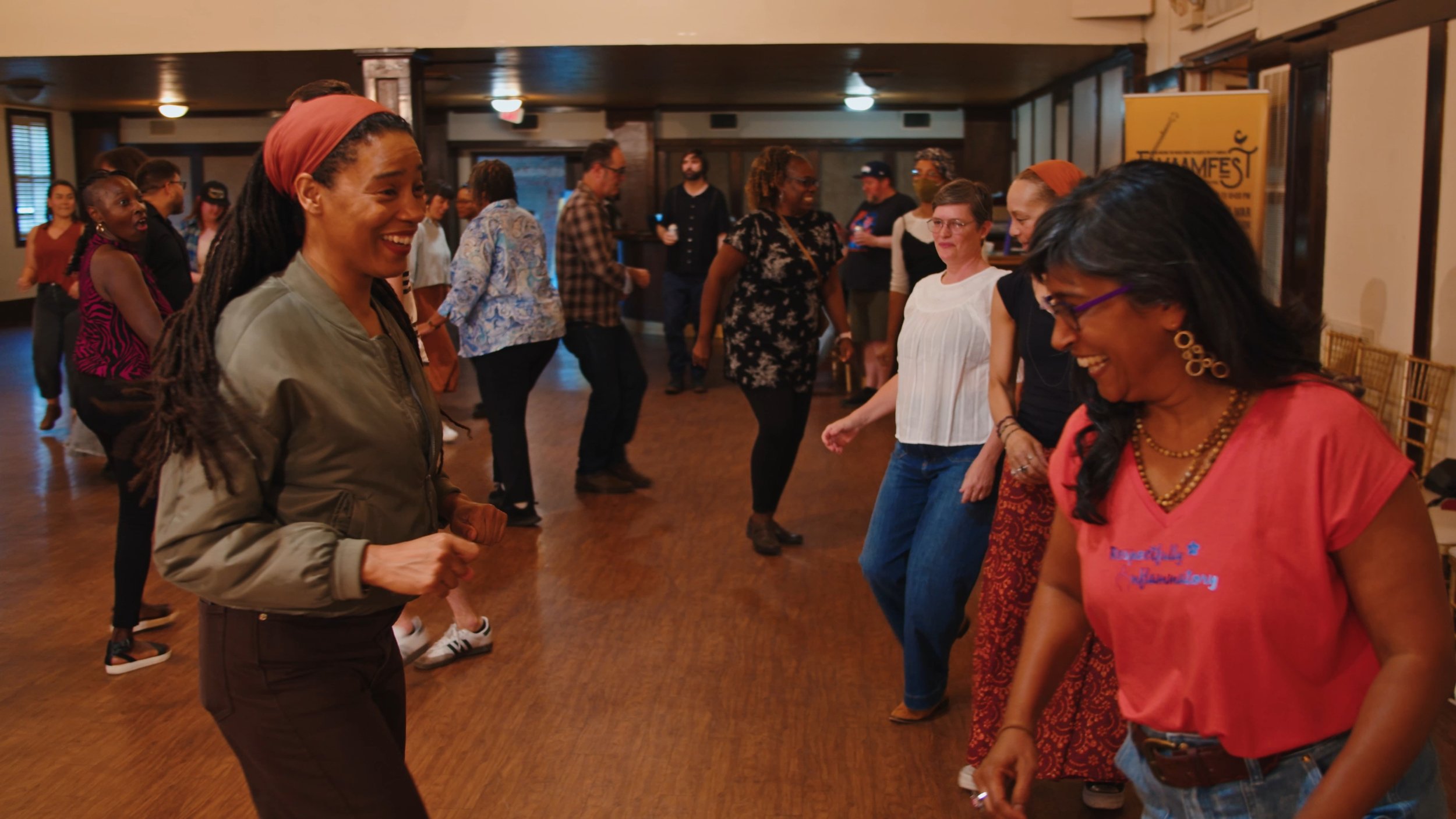 Amanda Ewing dances with attendee (1).jpg