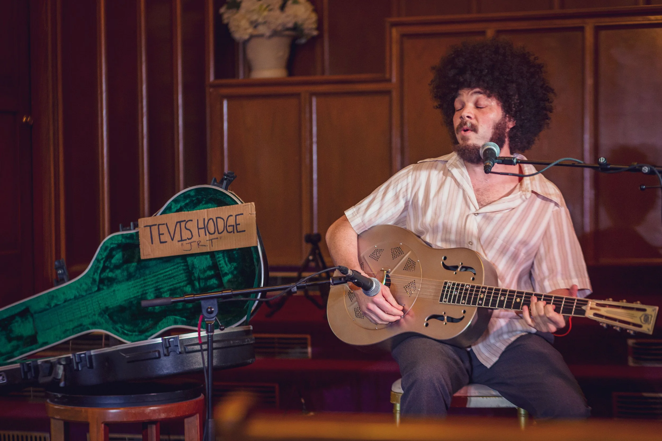 Tevis Hodge, Jr. Sings and plays resonator guitar