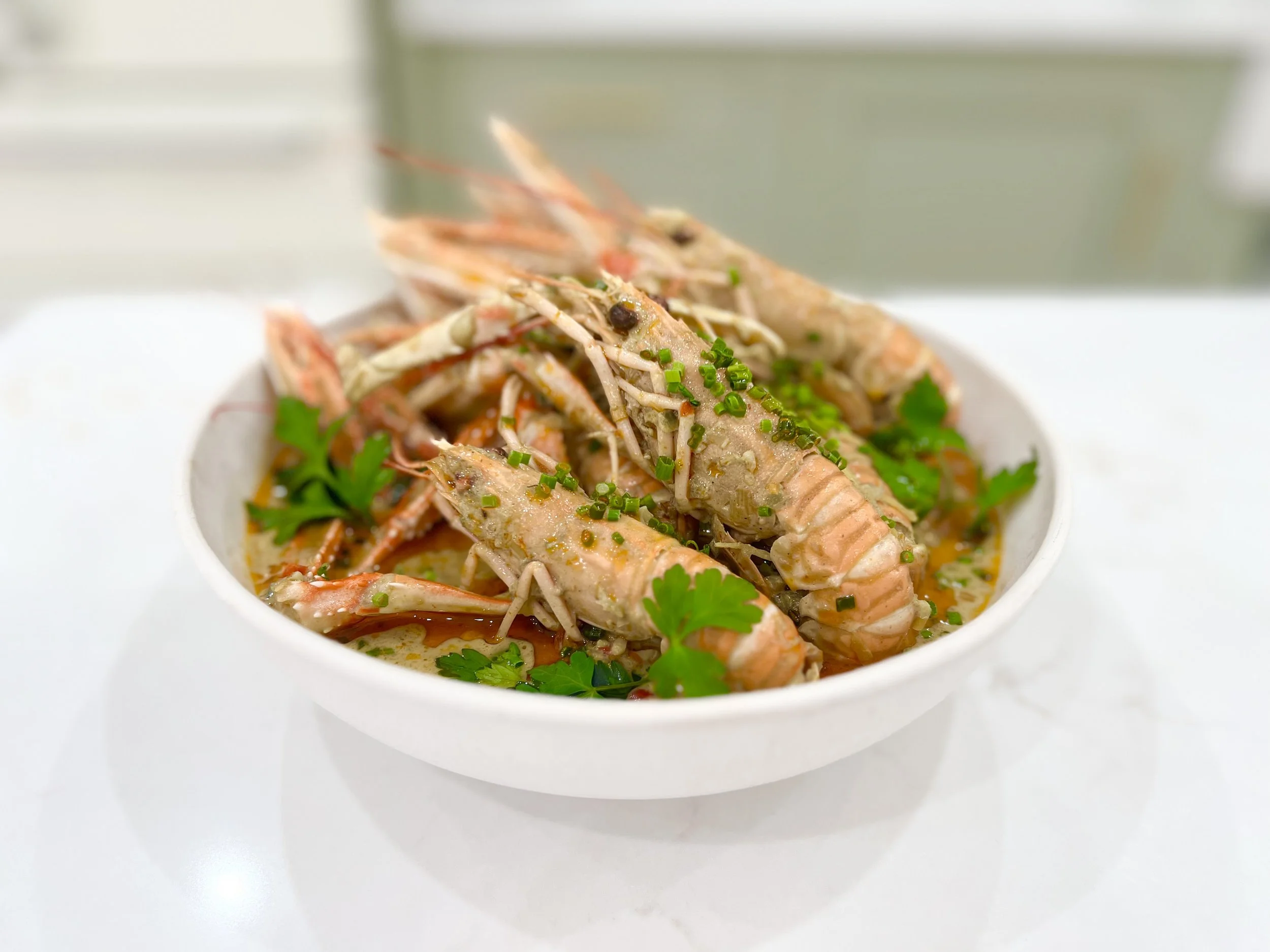 LANGOUSTINE SAUTÉED IN A LEMONGRASS & COCONUT CREAM SAUCE