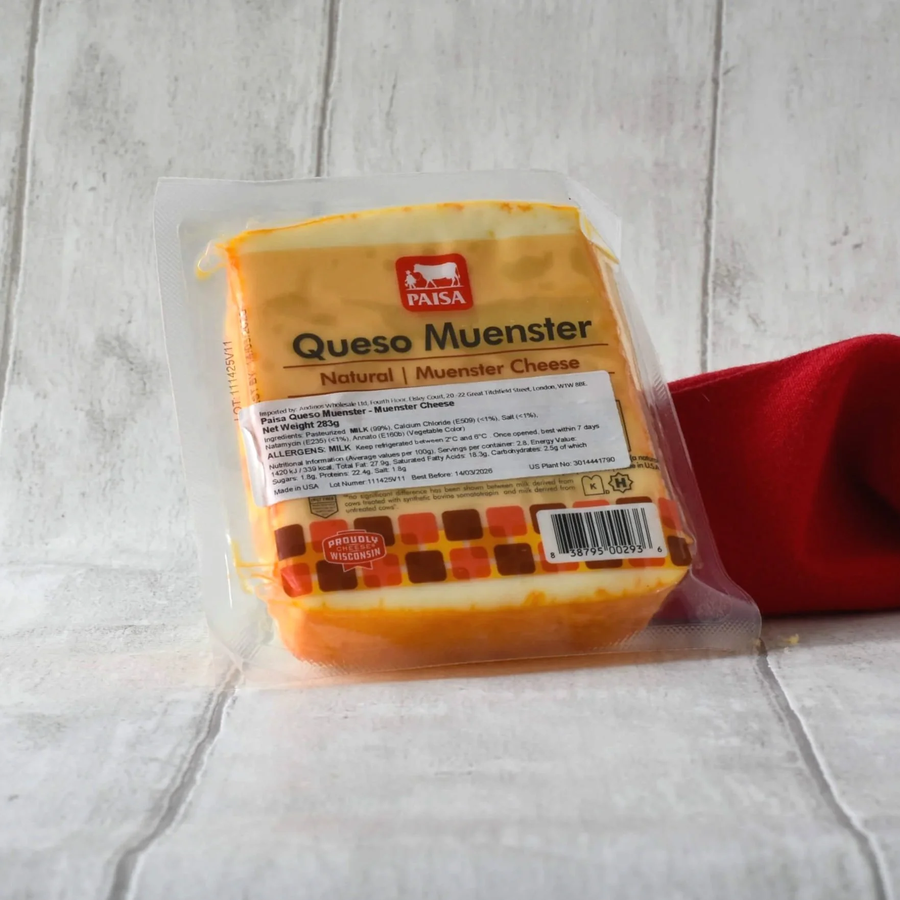 Muenster cheese from Paisa in packaging with red napkin