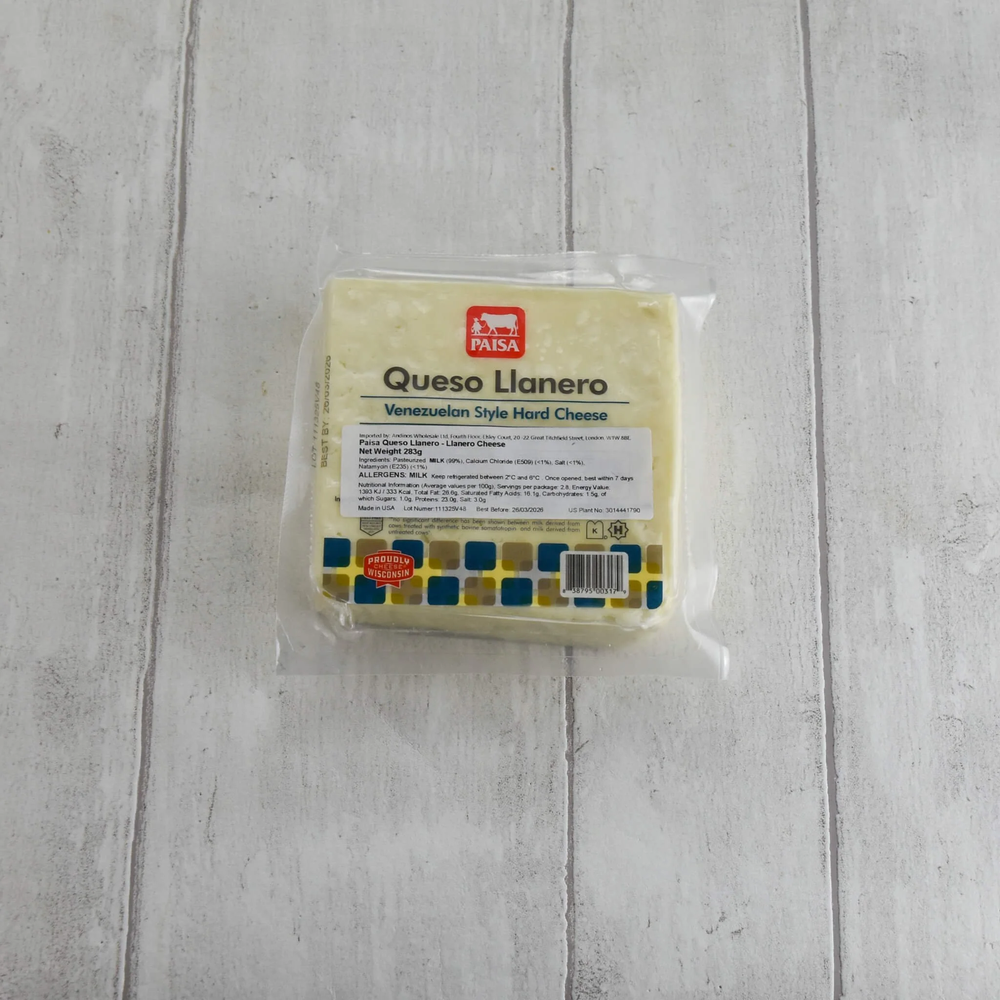 Queso Paisa venezolano tipo llanero shown on white washed wood