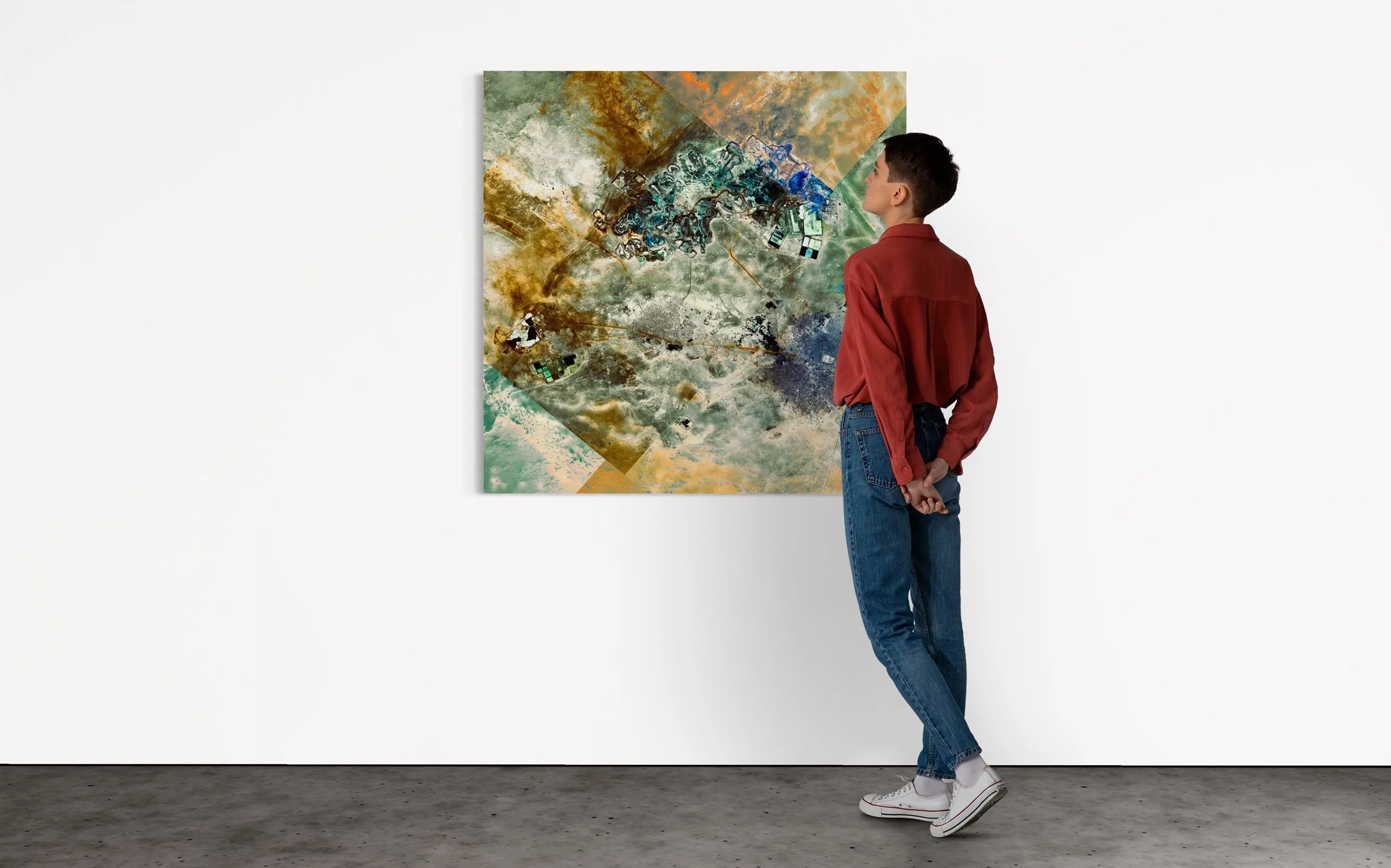 museum installation of  Arlit Mine  a limited-edition satellite fine art artwork by Federico Winer, portraying a uranium mining landscape in Niger as a powerful abstract composition with museum-quality production.