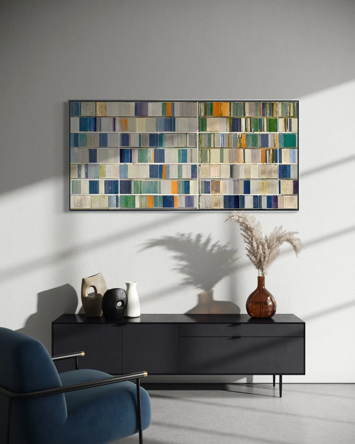 Modern living room with a black sideboard, decorative vases, and a framed colorful abstract artwork on the wall. Sunlight creates shadow patterns on the white wall.