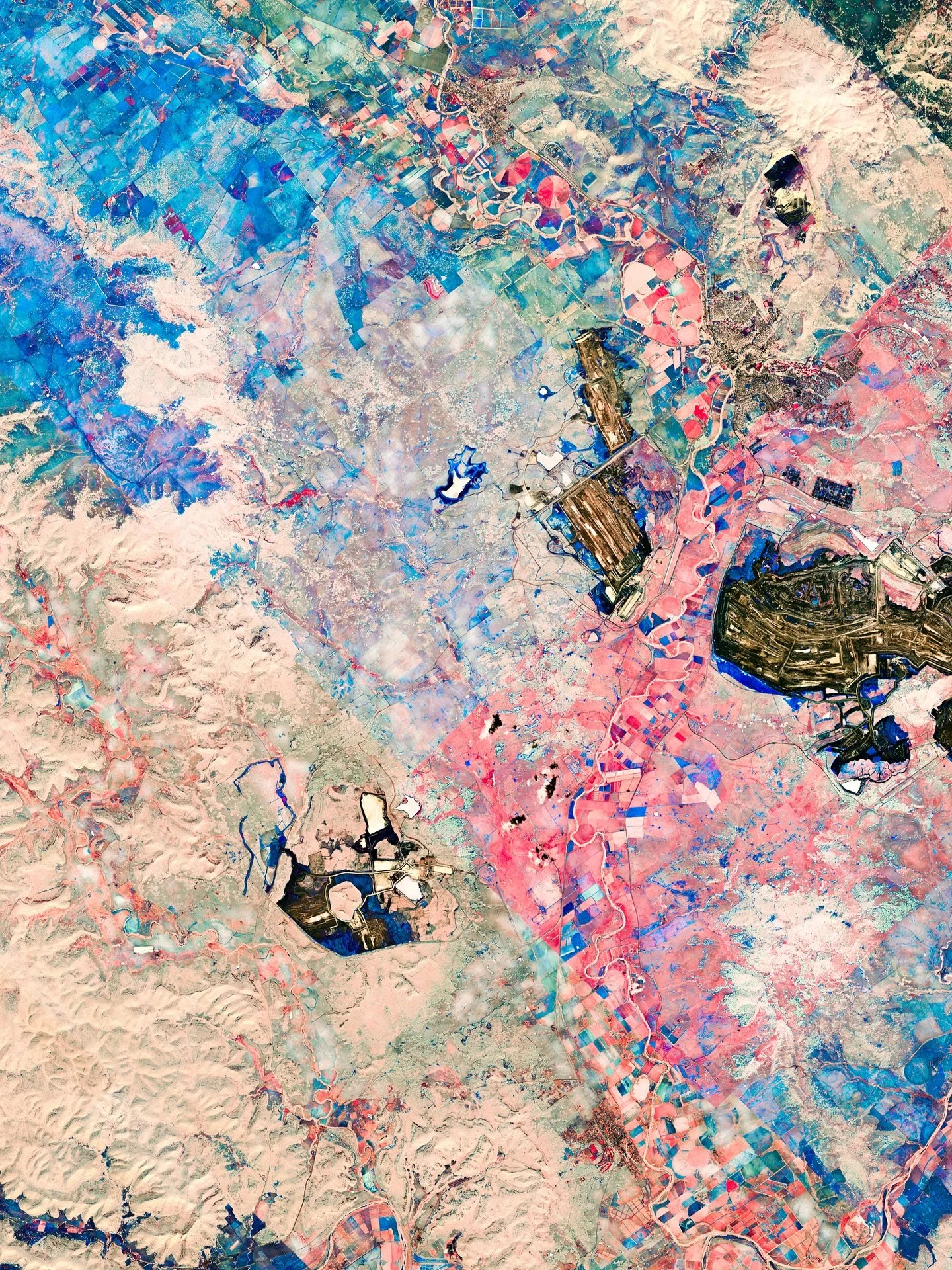 HUNTER VALLEY MINES &mdash; New South Wales, Australia

Seen from orbit, the Hunter Valley coal basin unfurls like an immense charcoal tapestry.
This unique artwork, created in extreme high definition through a singular art process by Federico Winer,