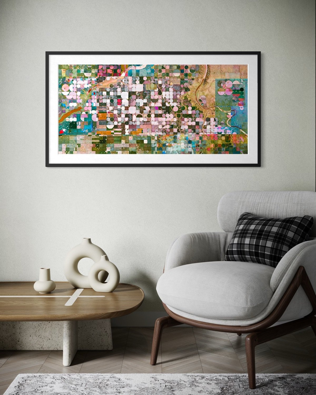 Ultradistancia Burdett by Federico Winer installed in a contemporary interior, showing a wide-format satellite artwork with circular irrigation patterns and pastel agricultural geometry from Alberta, Canada.