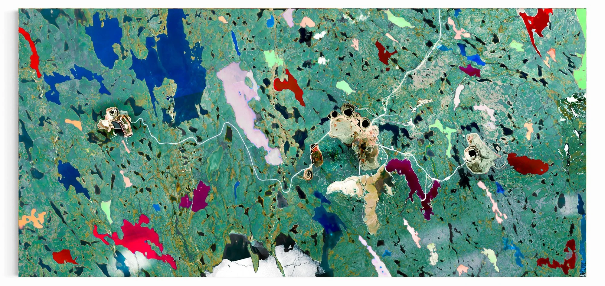 Panoramic satellite view of Ekati Mine in northern Canada, with open pits, winding roads, blue lakes, and vivid magenta and red water bodies set within a green subarctic terrain.