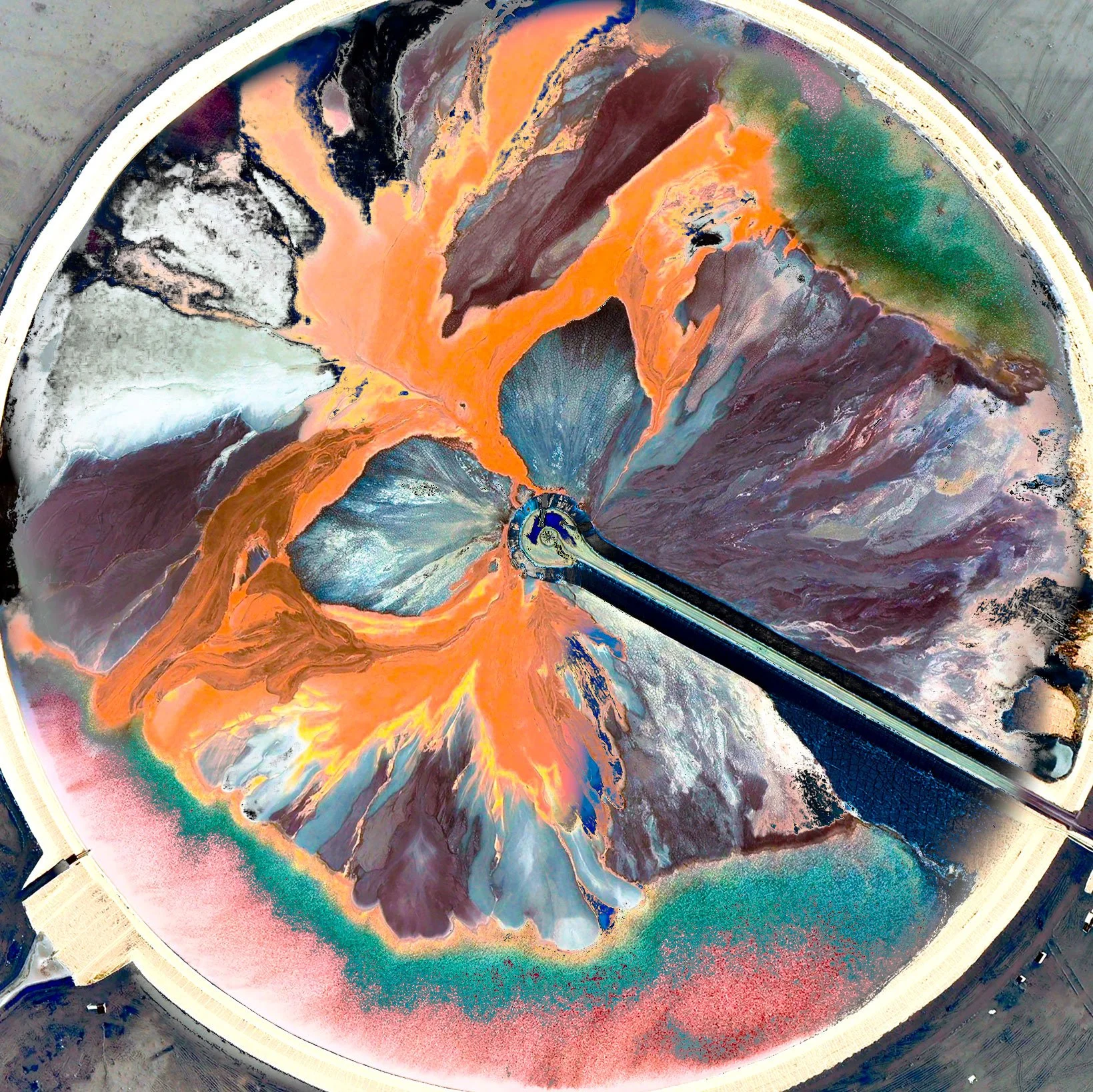Close-up of a circular abstract artwork with swirling colors including orange, green, purple, blue, black, gray, and white, resembling a marbled or cosmic pattern.