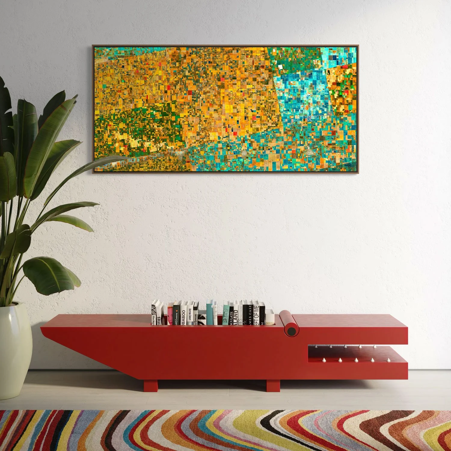 Framed panoramic satellite artwork of agricultural fields in Vila, Santa Fe, Argentina, displayed above a red console in a contemporary interior.
