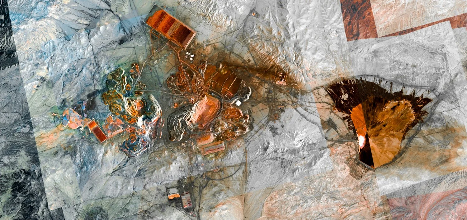 A satellite view of a mining site with a large open pit, buildings, and mining infrastructure in a mountainous area.