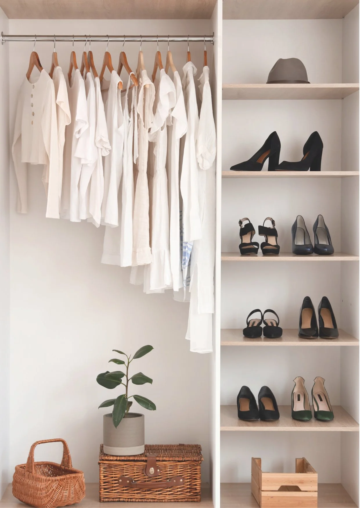 organized, zen closet with white clothing and ordered shoes