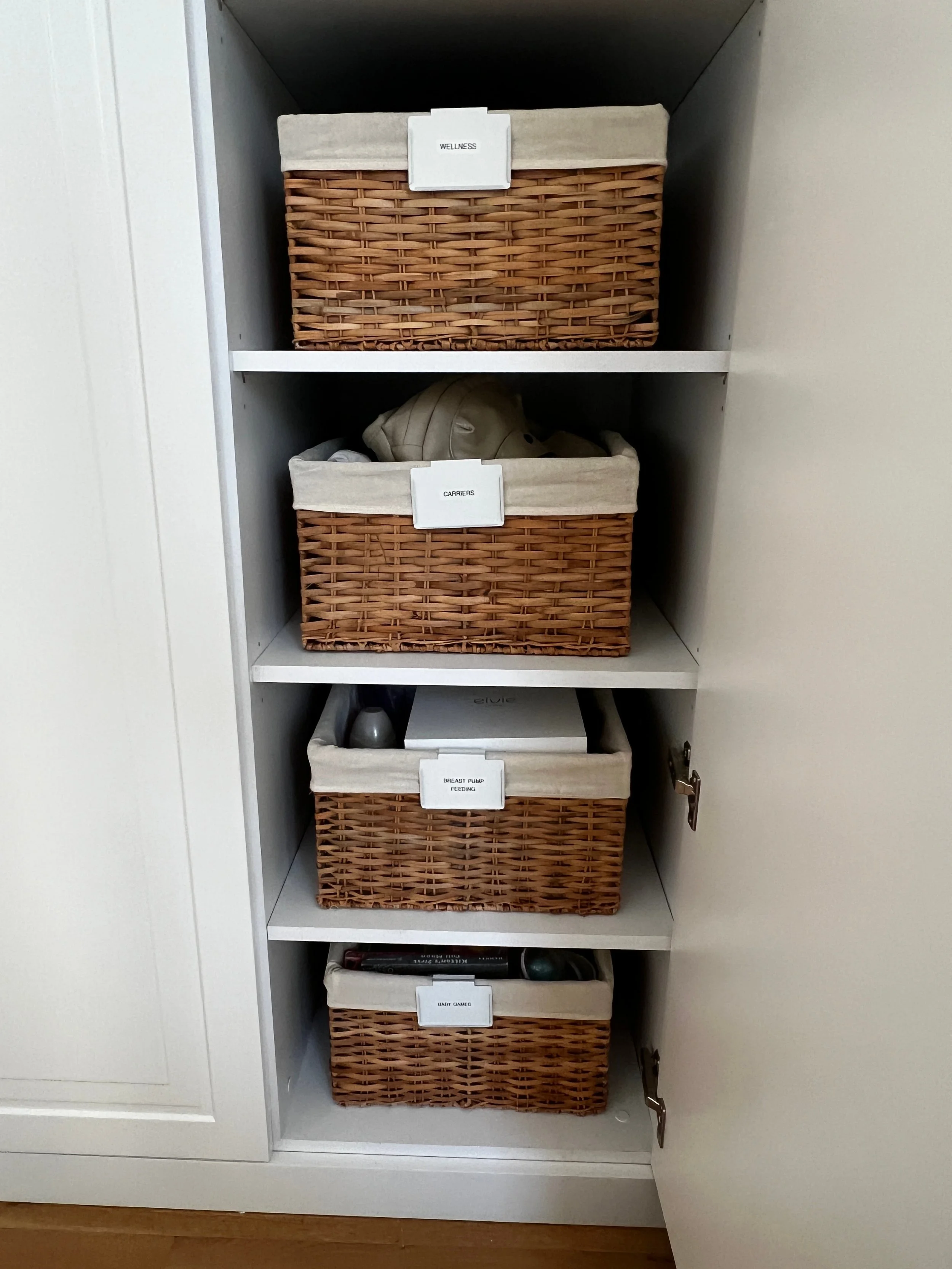 Pantry organized with wicker baskets