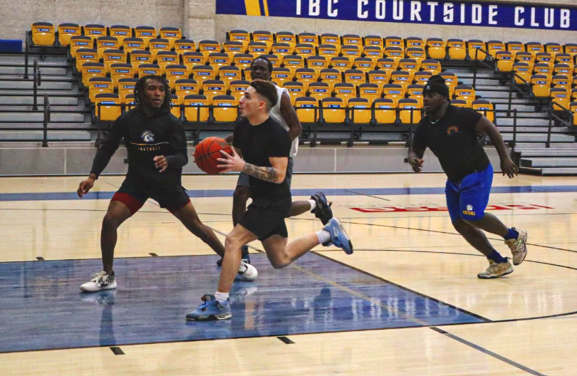 Charger students play intramural basketball.