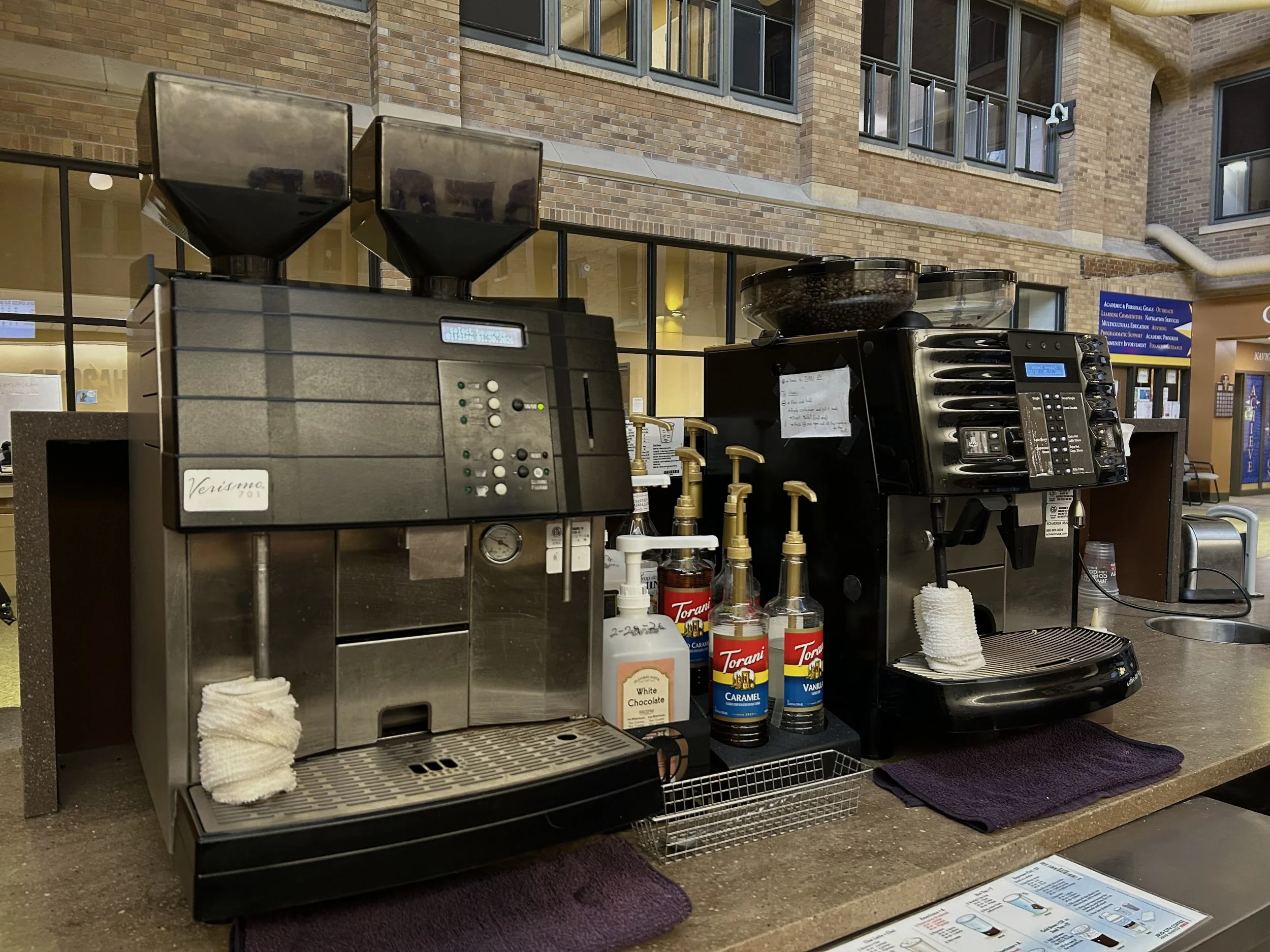 Behind the counter with a barista.
