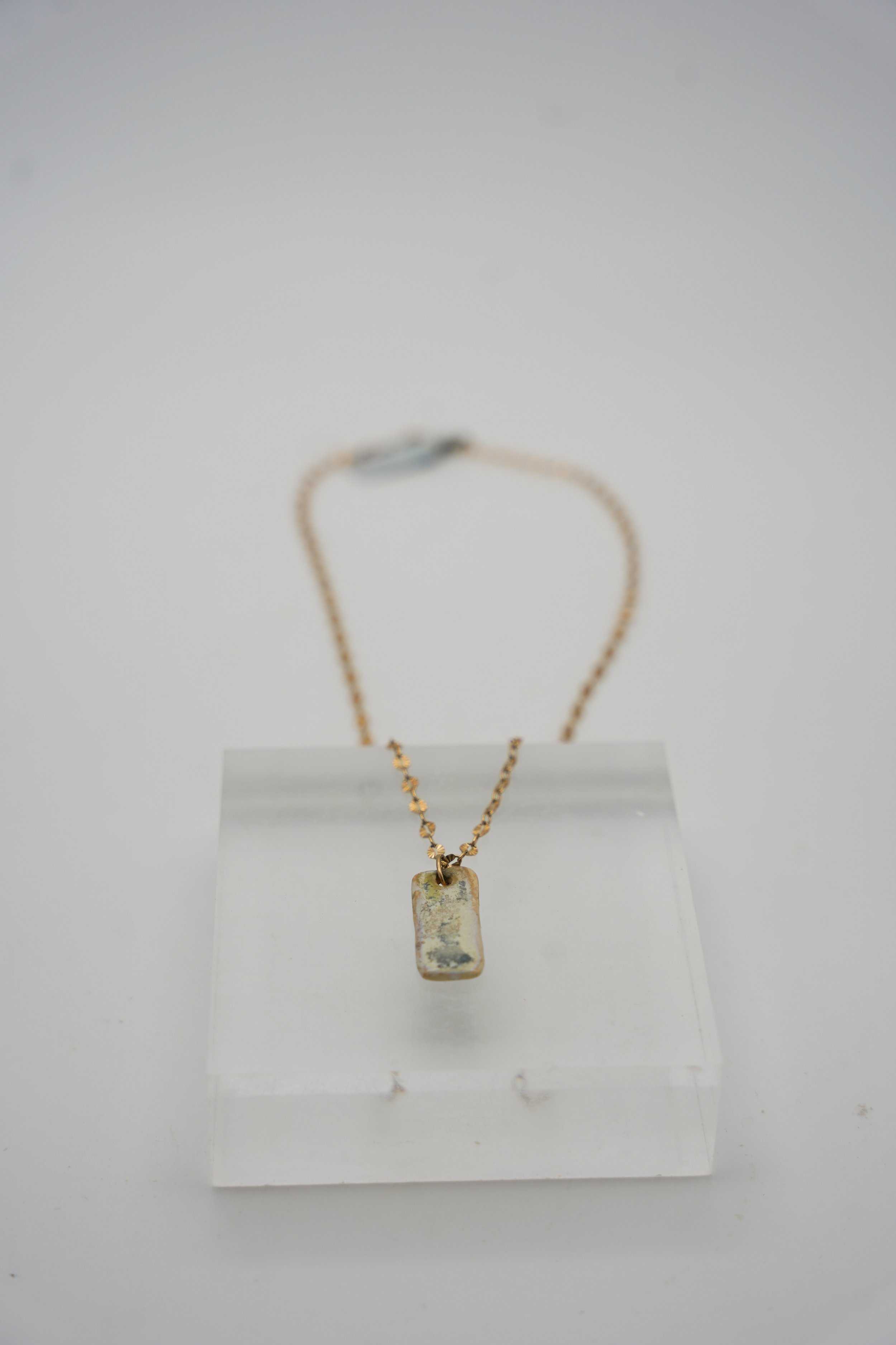Small Bar on Gold Filled Sunburst Chain in Crystal Cream