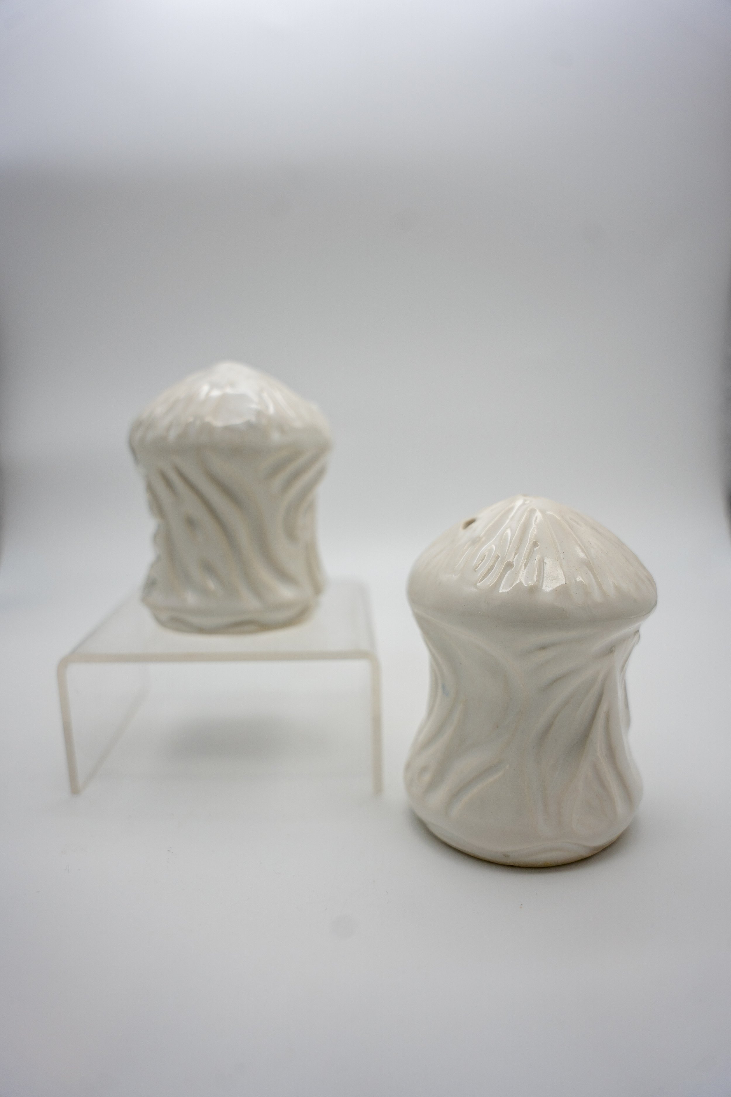 White carved salt & pepper shakers