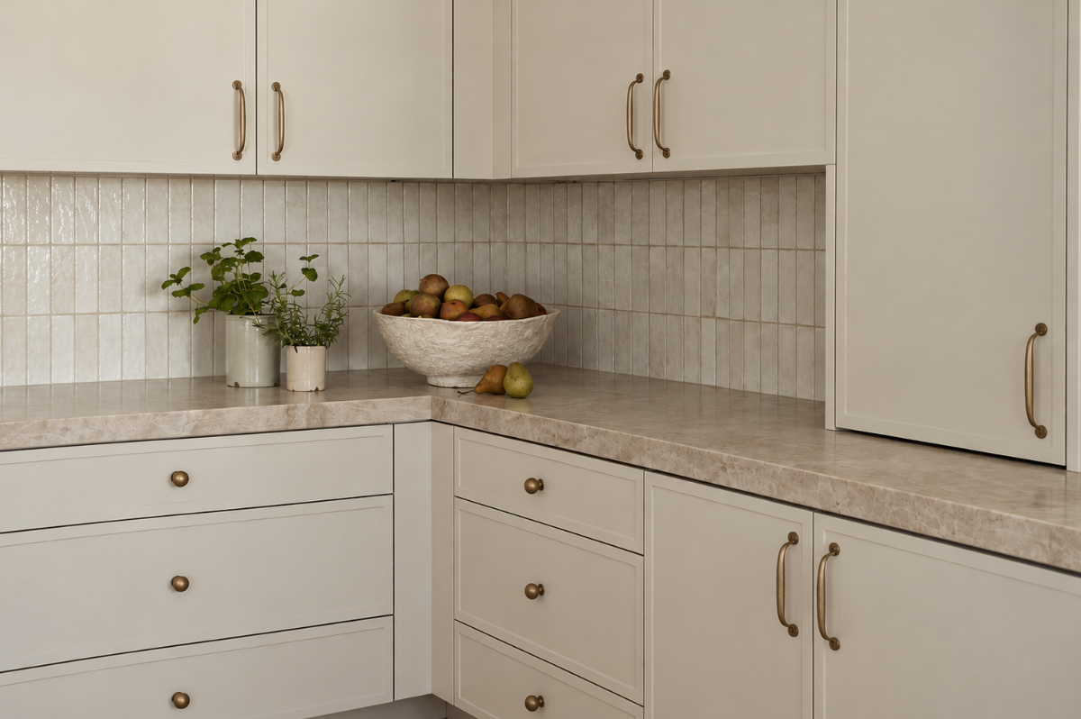 Kitchen with new stone countertops installed over existing cabinetry
