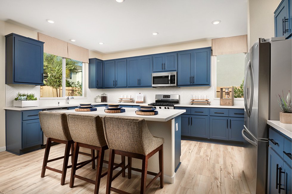 Marcona model home, Residence Four kitchen island and kitchen in Keyes, California