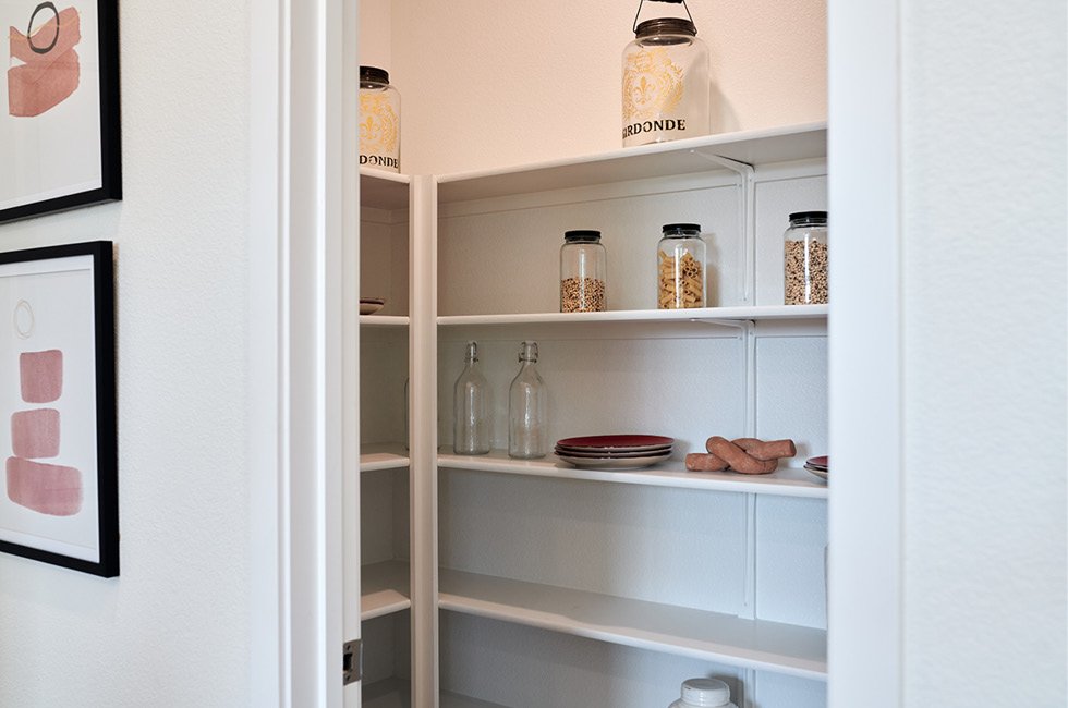 Walk-in pantry in our model home, residence one, at Marcona in Keyes, California