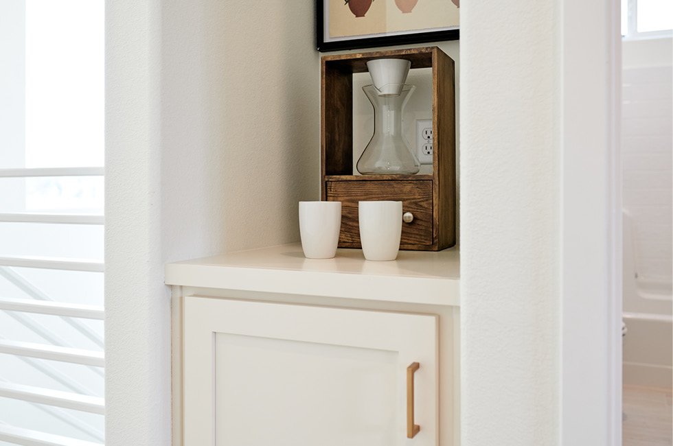 Coffee station at linen closet in our Marcona model home in Keyes, California