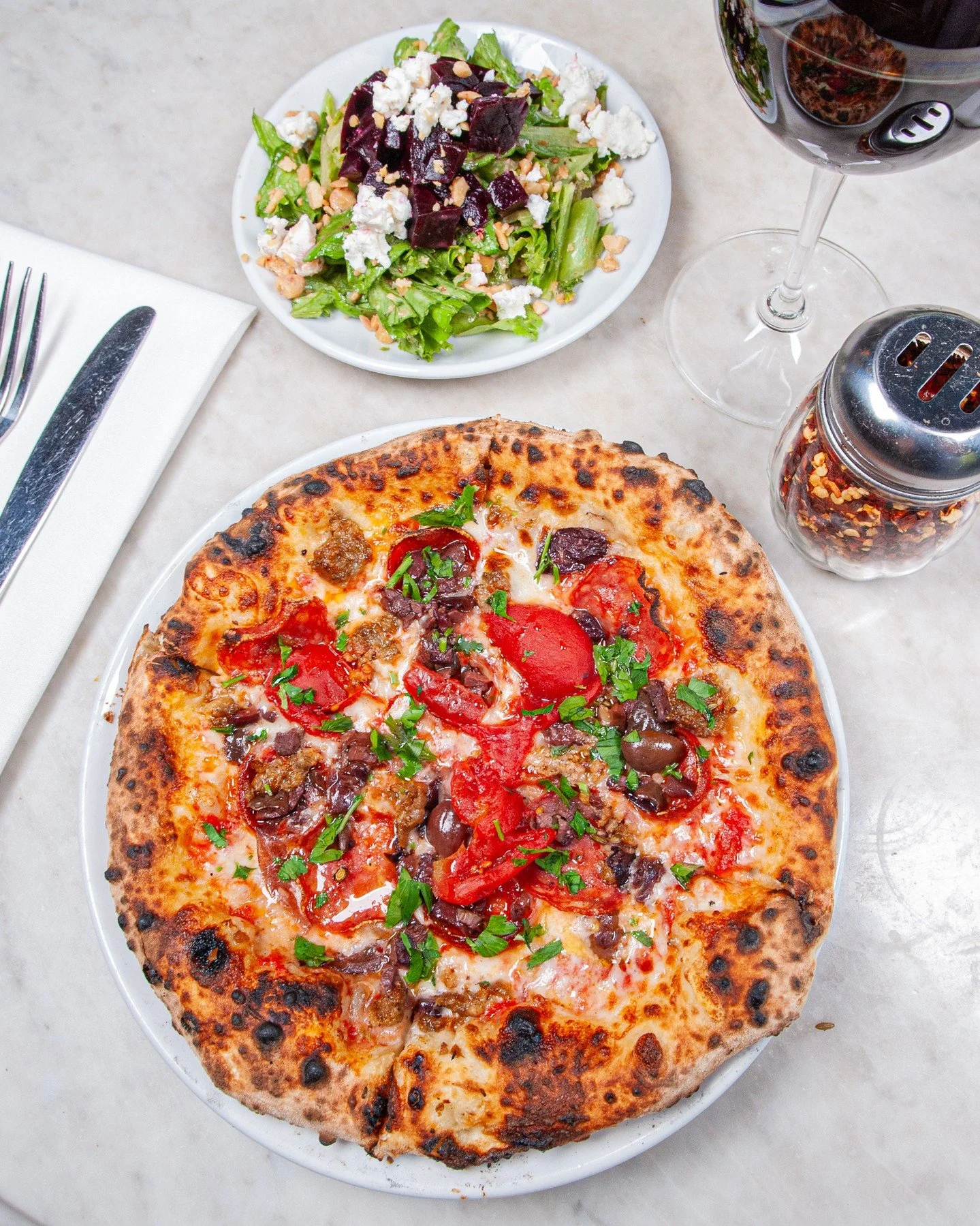 The perfect weekend treat or midday escape during the work week. Pair your favorite 8" pizza with a small Caesar, beet, or arugula salad for $21. Add a glass of house wine for $5, et voil&agrave; ✨️⁠
⁠
Our lunch special is available daily from o