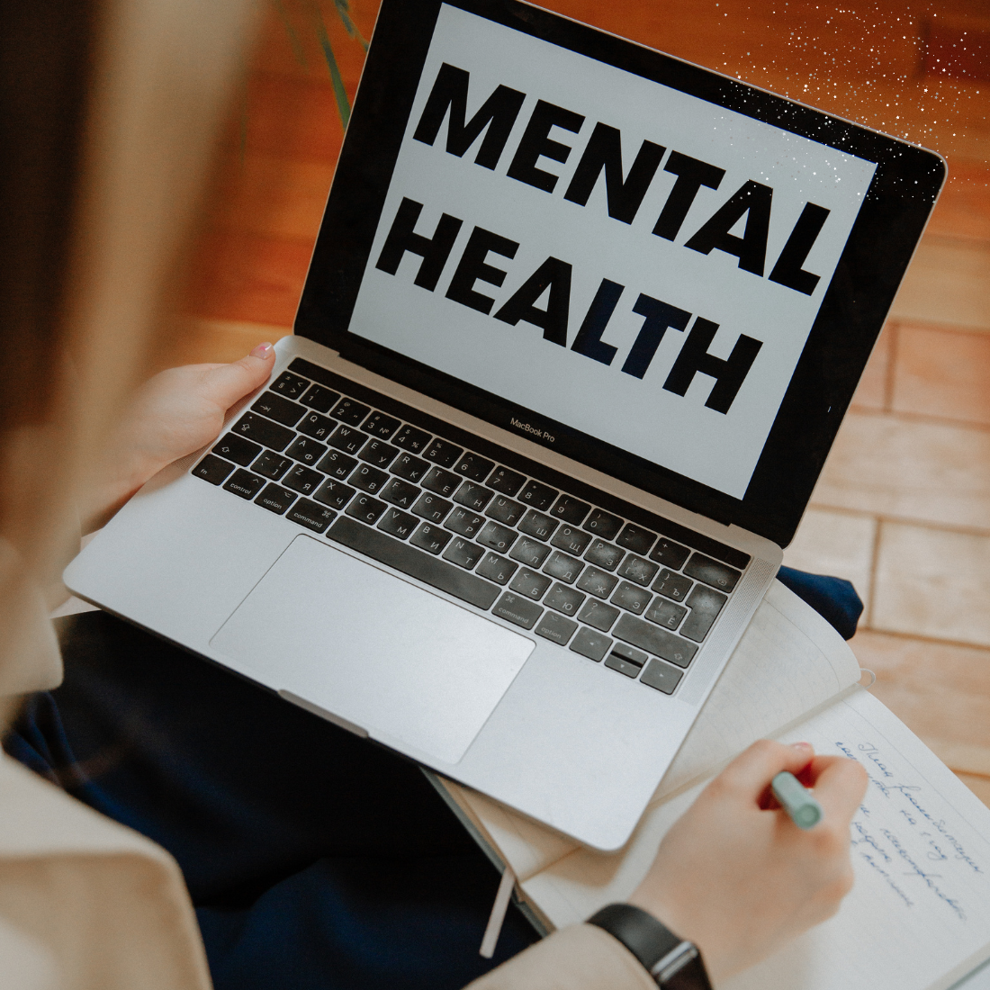 Lap top with the words mental health on the scree